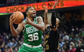 Boston Celtics guard Marcus Smart attacks the rim.