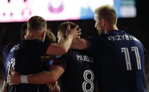 Chicago Fire forward Chris Mueller (8) celebrates with teammates