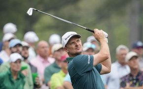 Justin Rose tees off on the 12th tee during a practice round for 2023 The Masters