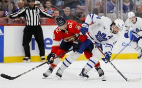 Toronto Maple Leafs center Auston Matthews protects the puck from Florida Panthers defenseman Brandon Montour