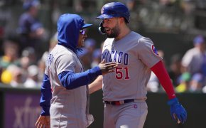 Chicago Cubs first baseman Eric Hosmer celebrates with pitcher Marcus Stroman