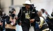 Colorado Buffaloes head coach Deion Sanders hits the field before the start of the spring game