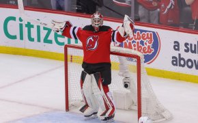 New Jersey Devils goaltender Akira Schmid celebrates the series win