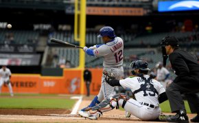 New York Mets shortstop Francisco Lindor hitting a single