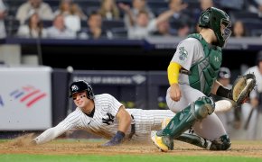 New York Yankees shortstop Anthony Volpe slides into home