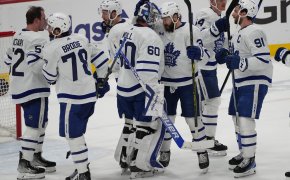 Toronto Maple Leafs goaltender Joseph Woll celebrates victory with teammates against Florida Panthers