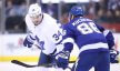 Toronto Maple Leafs center Auston Matthews talks to Tampa Bay Lightning right wing Nikita Kucherov