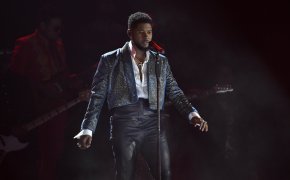 Usher performs on stage