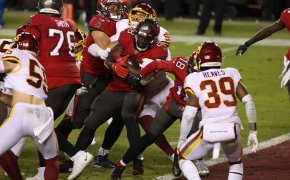 Tampa Bay Buccaneers running back Leonard Fournette (28) scores a touchdown
