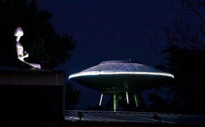 Aliens on the rooftop of house
