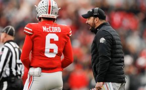 Ohio State Buckeyes head coach Ryan Day gives a play to quarterback Kyle McCord