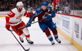 Colorado Avalanche center Nathan MacKinnon and Detroit Red Wings center Michael Rasmussen