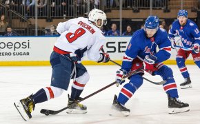New York Rangers defenseman Jacob Trouba tips the puck away from Washington Capitals left wing Alex Ovechkin during the second period at Madison Square Garden