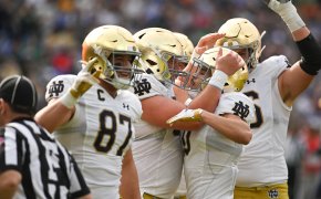 Notre Dame Fighting Irish players celebrating a TD against the Navy Midshipmen