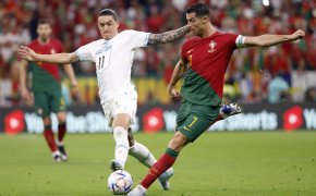 Portugal forward Cristiano Ronaldo (7) shoots on goal against Uruguay forward Darwin Nunez