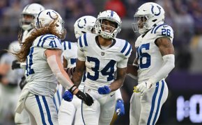 Indianapolis Colts cornerback Isaiah Rodgers (34) and safety Rodney McLeod (26) and linebacker Grant Stuard (41) react against the Minnesota Vikings