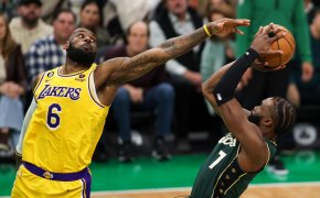 Boston Celtics forward Jaylen Brown shoots a fadeaway against Los Angeles Lakers forward LeBron James