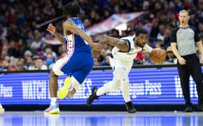 Dallas Mavericks guard Kyrie Irving drives past Philadelphia 76ers guard Tyrese Maxey