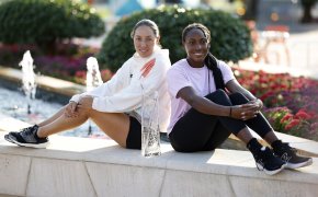 Jessica Pegula and Coco Gauff (both USA) pose for a portrait with the Butch Buchholz championship trophy
