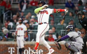 Marcell Ozuna drives in a run versus the Rockies.