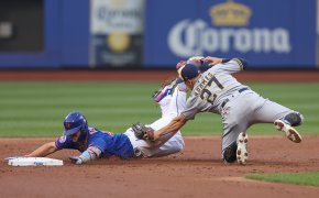 New York Mets first baseman Pete Alonso tagged out at second base by Milwaukee Brewers shortstop Willy Adames