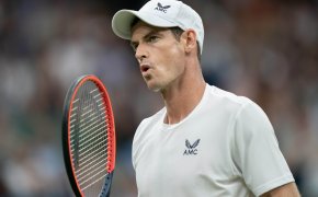 Andy Murray (GBR) reacts to a point during his match against Ryan Peniston (GBR) at the All England Lawn Tennis and Croquet Club.