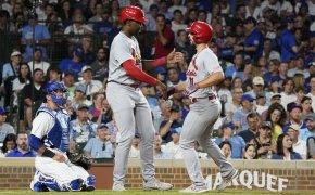St. Louis Cardinals shortstop Paul DeJong celebrates with right fielder Jordan Walker