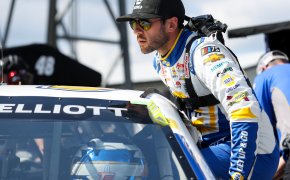 NASCAR Cup Series driver Chase Elliott climbing out of his car
