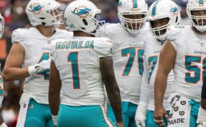 Dolphins quarterback Tua Tagovailoa (1) waits for a play to be called against the Houston Texans
