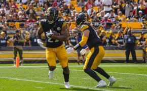 Pittsburgh Steelers running back Najee Harris (22) runs with the ball against the San Francisco 49ers during the second half at Acrisure Stadium.