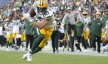 Green Bay Packers tight end Luke Musgrave (88) is wide open for a long reception