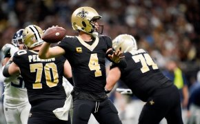 New Orleans Saints quarterback Derek Carr throwing the ball