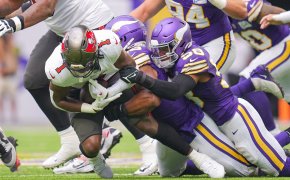 Rachaad White tackled by the Vikings in Week 1