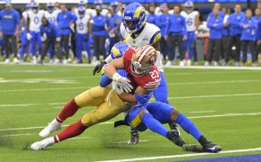 San Francisco 49ers running back Christian McCaffrey (23) gets by Los Angeles Rams safety John Johnson III (43) for a touchdown