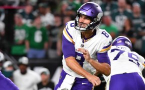 Minnesota Vikings quarterback Kirk Cousins throwing a pass