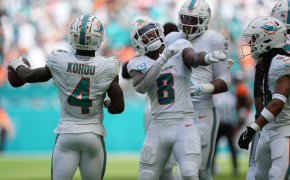 Miami Dolphins safety Jevon Holland celebrating an interception