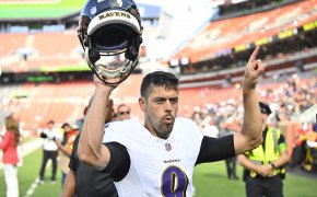 Baltimore Ravens place kicker Justin Tucker (9) walks off the field after a win