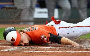 Baltimore Orioles third baseman Gunnar Henderson sliding into home