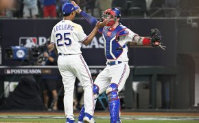Texas Rangers closer Jose Leclerc celebrates a victory with catcher Jonah Heim