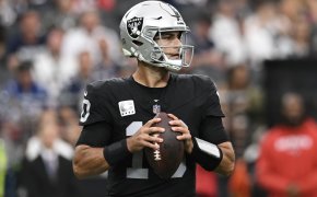 Raiders QB Jimmy Garoppolo (back) will be playing in the Week 8 MNF game against the Lions.