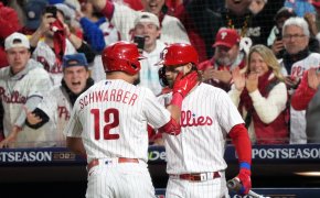 Philadelphia Phillies Kyle Schwarber and Bryce Harper celebrate a home run