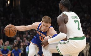 New York Knicks guard Donte DiVincenzo drives against Boston Celtics guard Jaylen Brown