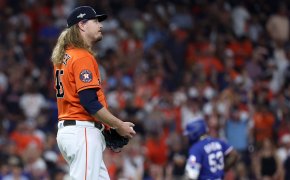 Houston Astros relief pitcher Ryne Stanek looks forlorn after giving up a grand slam to Adolis Garcia