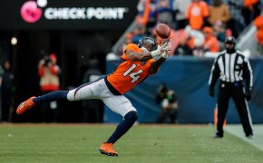 Denver Broncos wide receiver Courtland Sutton (14) dives for a pass
