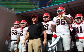 Georgia Bulldogs head coach Kirby Smart leading his team onto the field