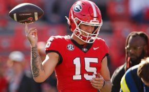 Georgia quarterback Carson Beck spinning a ball on his finger
