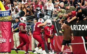 Arizona Cardinals quarterback Kyler Murray (1) reacts after scoring his first touchdown of the 2023 season