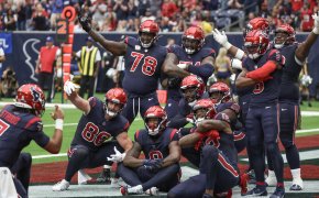 Houston Texans quarterback C.J. Stroud (7) celebrates the Texans touchdown by taking a picture of the offense
