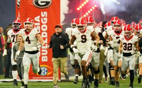 Georgia Bulldogs running out of a tunnel