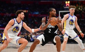 Los Angeles Clippers forward Kawhi Leonard holds the ball against the Golden State Warriors